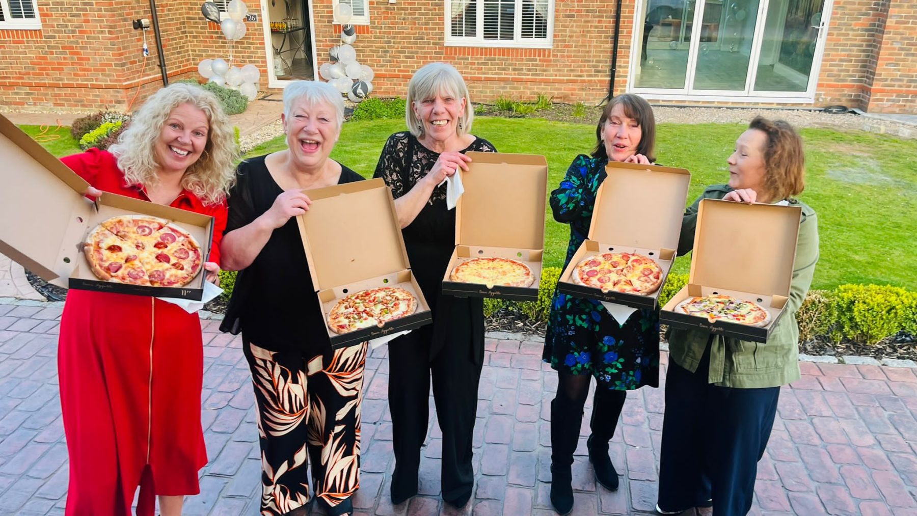 Customers Being Served at Pizza Van