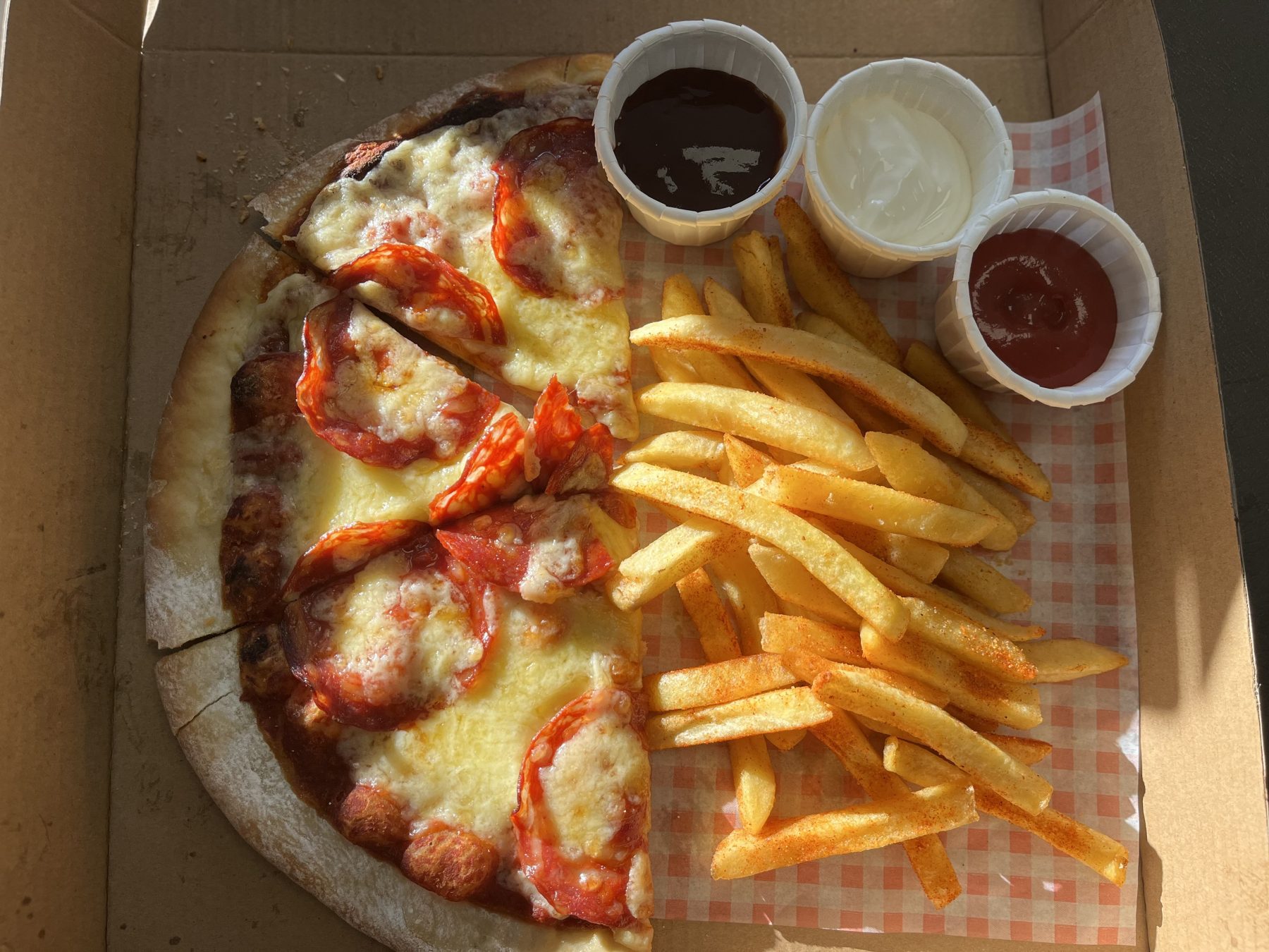 Pepperoni Pizza from KK Catering served with chips and dips